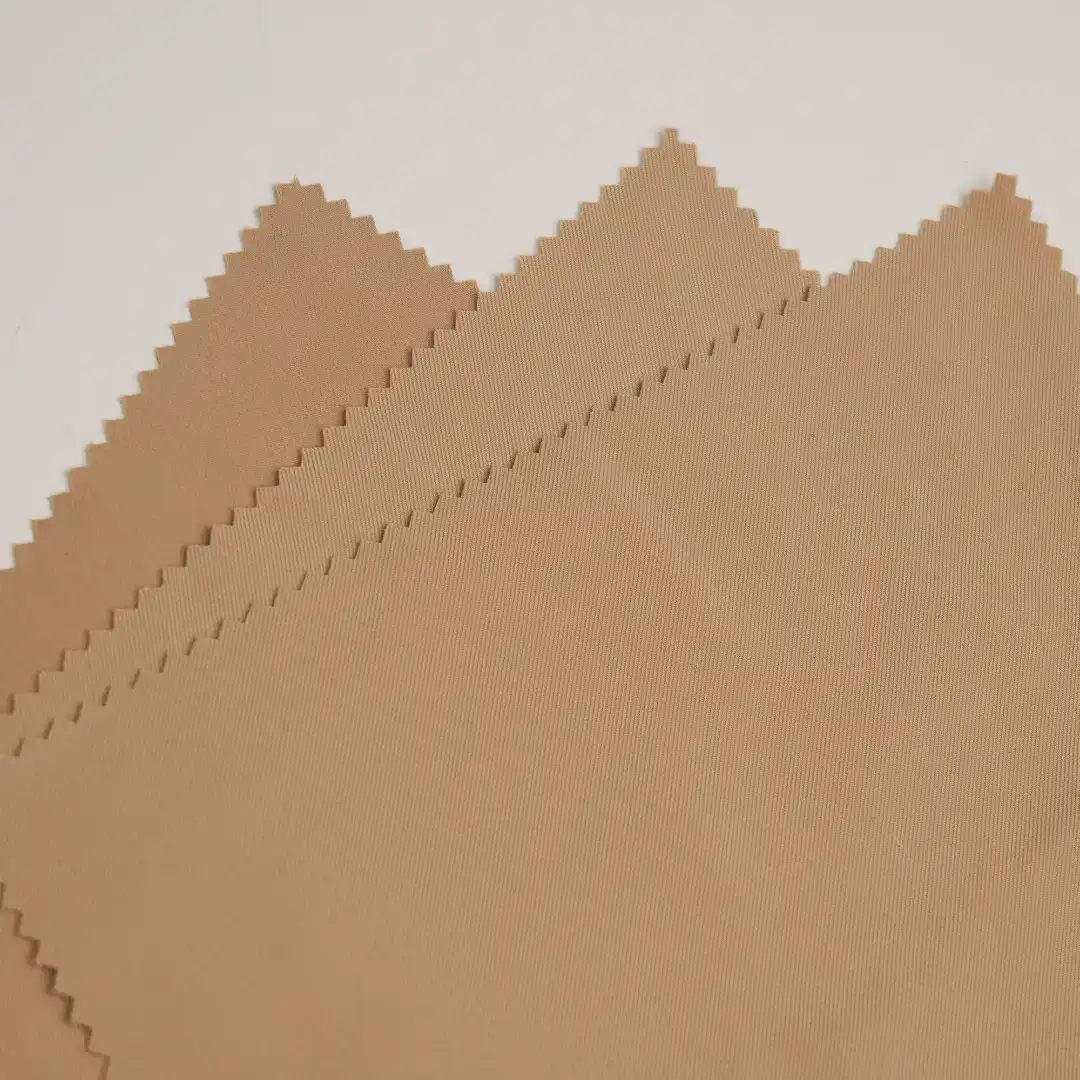 China Fabric for Blazer,Suit,Uniform Four Stretch Polyester Woven Fabric Synthetic Woven Fabric Polyester Spandex Light coffee color buy from China wholesaler bulk order at wholesale price free worldwide shipping Alibaba