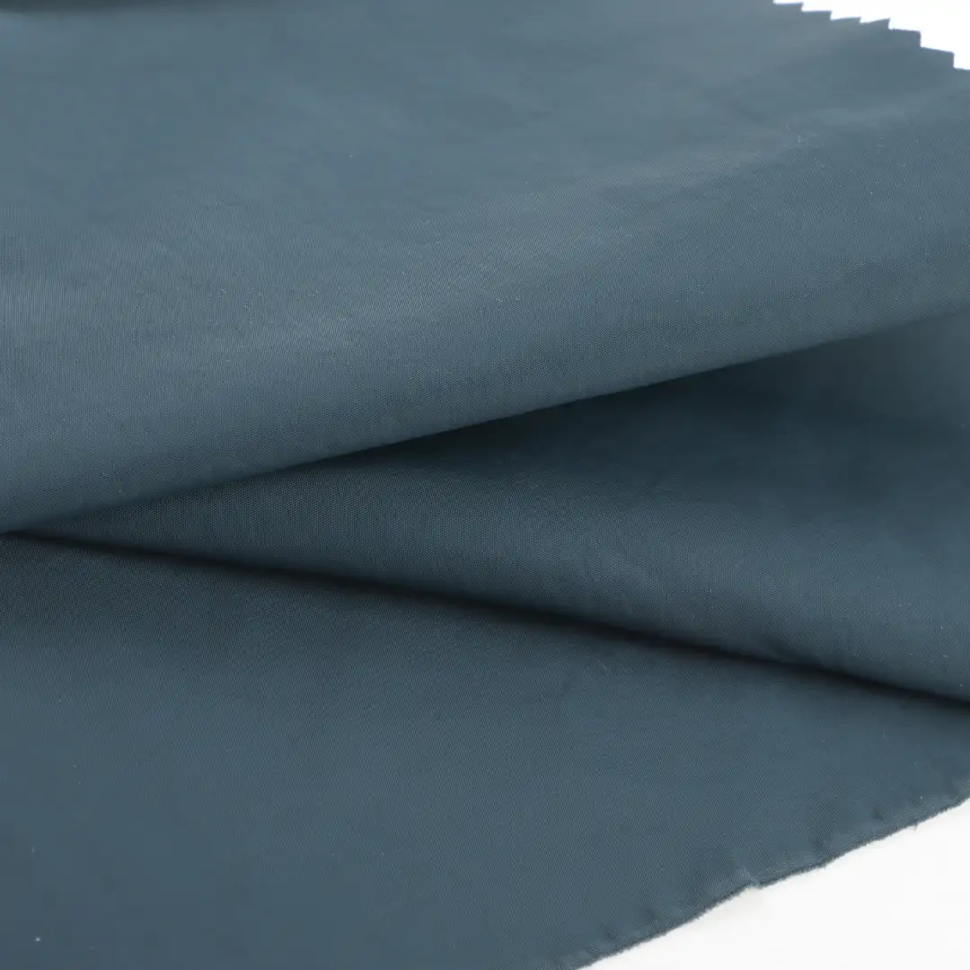 China Fabric for Padded Jacket Nylon Crepe Synthetic Woven Fabric re-nylon navy blue color buy from China wholesaler bulk order at wholesale price free worldwide shipping Alibaba