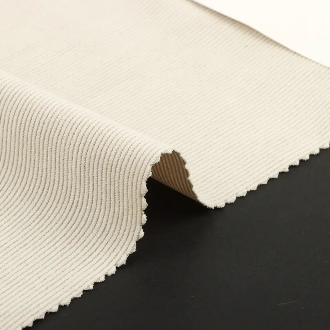 China Fabric for Pants,Jackets,Blazer,Hoodie knitted Corduroy Knit Fabric Polyester Beige color buy from China wholesaler bulk order at wholesale price free worldwide shipping Alibaba