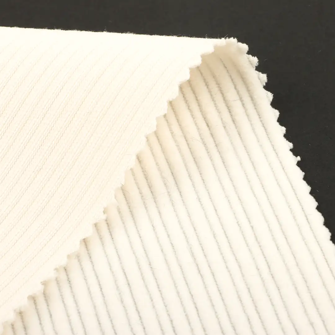 China Fabric for Pants,Jackets,Overcoat knitted Corduroy Knit Fabric Polyester cream color buy from China wholesaler bulk order at wholesale price free worldwide shipping Alibaba