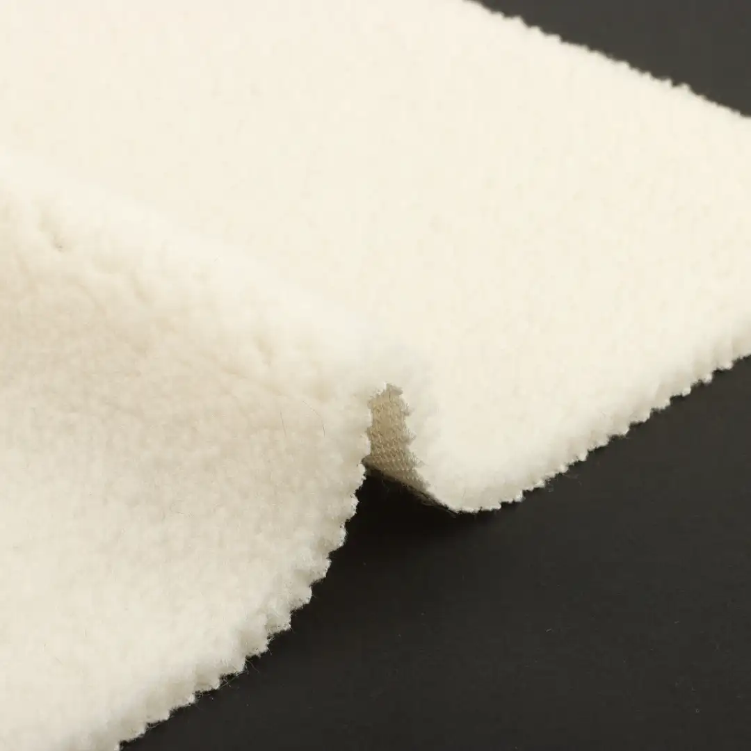 China Fabric for Overcoat Sherpa Knit Fabric Polyester cream color buy from China wholesaler bulk order at wholesale price free worldwide shipping Alibaba