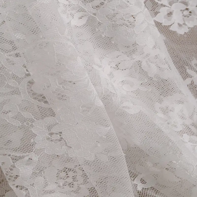 China Fabric for Skirt Lace Knit Fabric Nylon White color buy from China wholesaler bulk order at wholesale price free worldwide shipping Alibaba