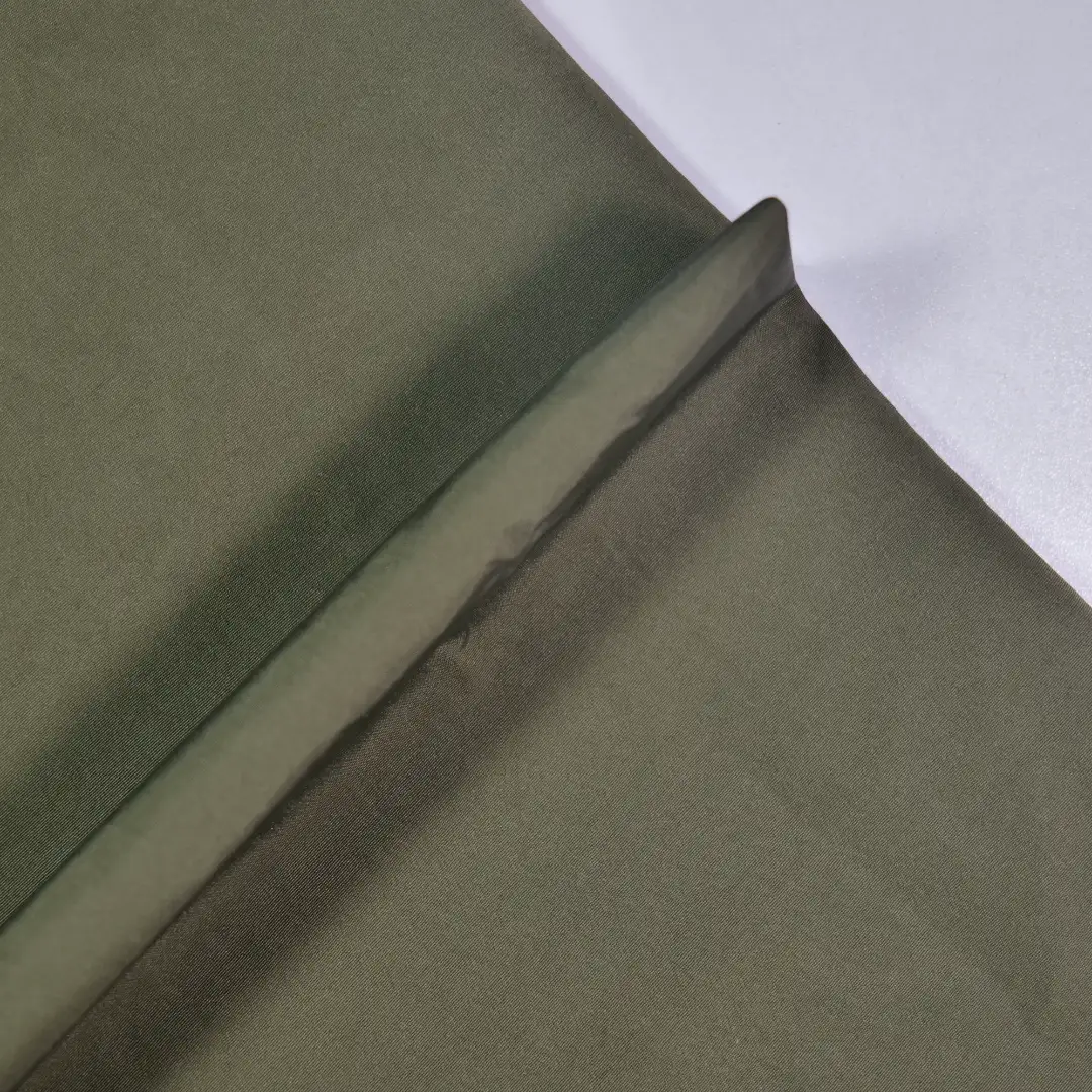 China Fabric for Trench Coat,Ruffle Shirt Dress,Strap Midi Dress Polyester Imitation Memory Fabric Synthetic Woven Fabric Nylon army green color buy from China wholesaler bulk order at wholesale price free worldwide shipping Alibaba