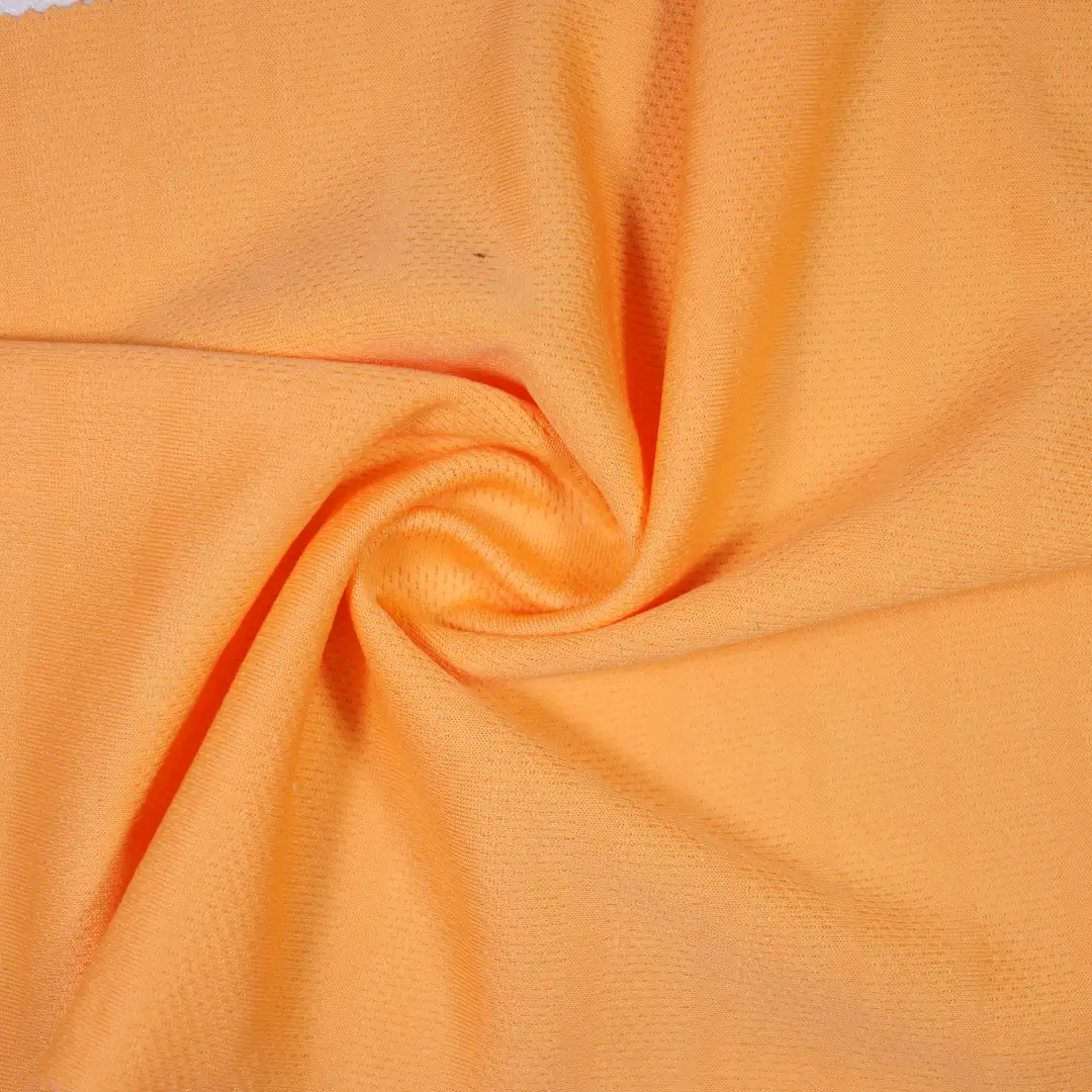 China Fabric for T-Shirt,Polo Shirt,Yoga Clothes Birdeye Mesh Knit Fabric Polyester Orange color buy from China wholesaler bulk order at wholesale price free worldwide shipping Alibaba