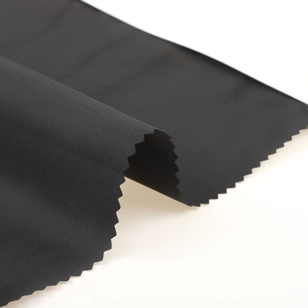 China Fabric for Jackets,Trench Coat,Overcoat Polyester Taffeta Synthetic Woven Fabric Polyester Black color buy from China wholesaler bulk order at wholesale price free worldwide shipping Alibaba
