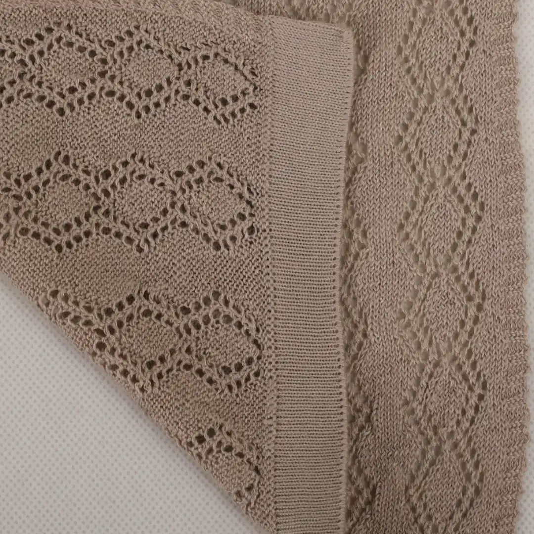 brown color yarn knitting swatch in diamond knitting pattern, yarn for knitting sweater, recycled polyester yarn, ring spun yarn, buy yarn in wholesale price.