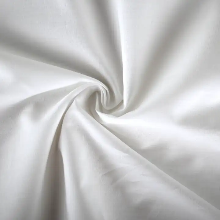 India Fabric for Shirt Cotton Plain Natural Woven Fabric Cotton Off White color buy from India wholesaler bulk order at wholesale price free worldwide shipping Alibaba