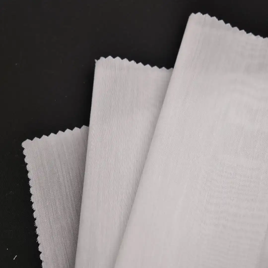 China Fabric for Shirt Rayon Plain Natural Woven Fabric Tencel Polyester White color buy from China wholesaler bulk order at wholesale price free worldwide shipping Alibaba