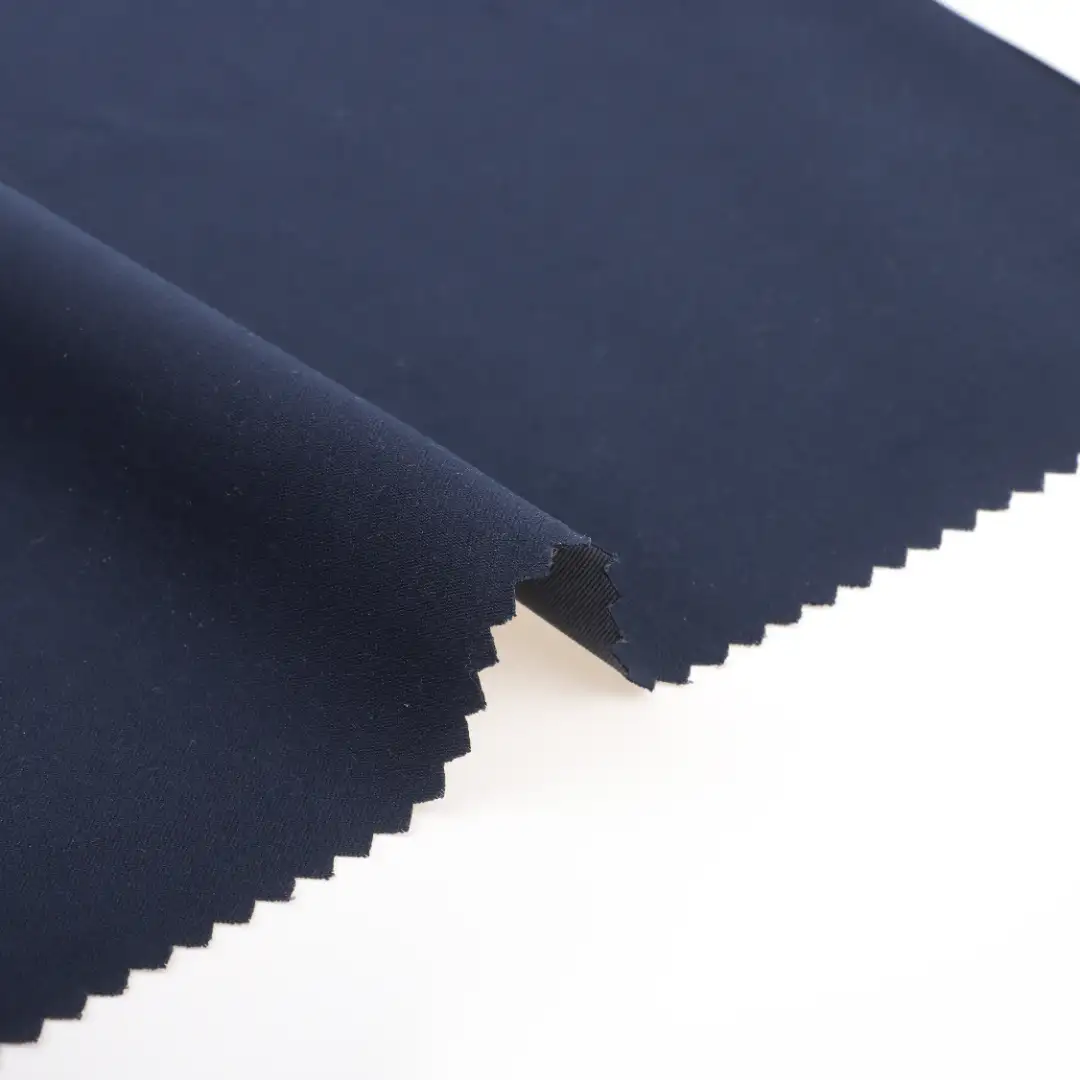 China Fabric for Pants Polyester Peach Skin Microfiber Fabric Synthetic Woven Fabric Polyester navy color buy from China wholesaler bulk order at wholesale price free worldwide shipping Alibaba