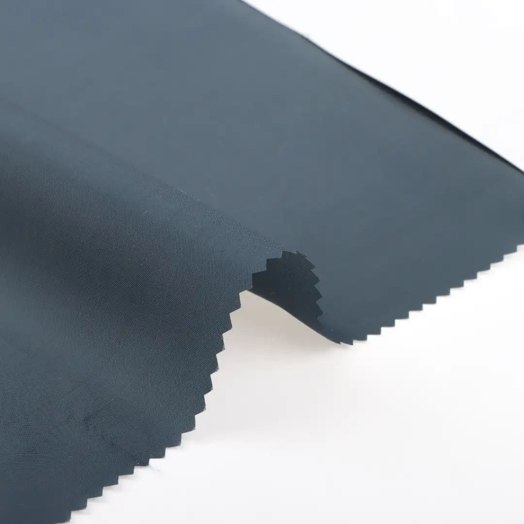 China Fabric for Padded Jacket Polyester Taffeta Synthetic Woven Fabric Recycled Polyester Navy blue color buy from China wholesaler bulk order at wholesale price free worldwide shipping Alibaba