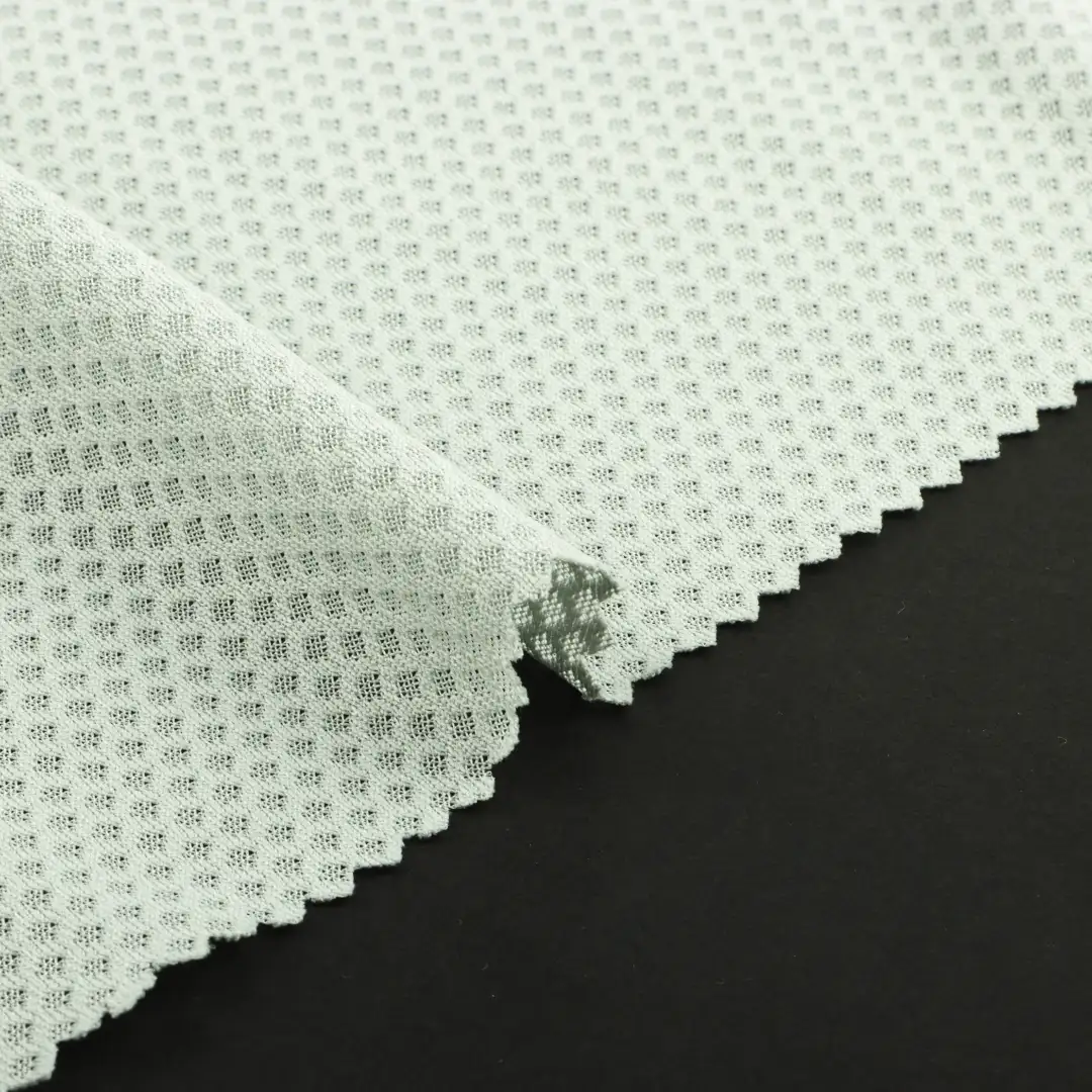 China Fabric for T-Shirt,Shorts,Tracksuits Birdeye Mesh Knit Fabric Polyester Light green color buy from China wholesaler bulk order at wholesale price free worldwide shipping Alibaba