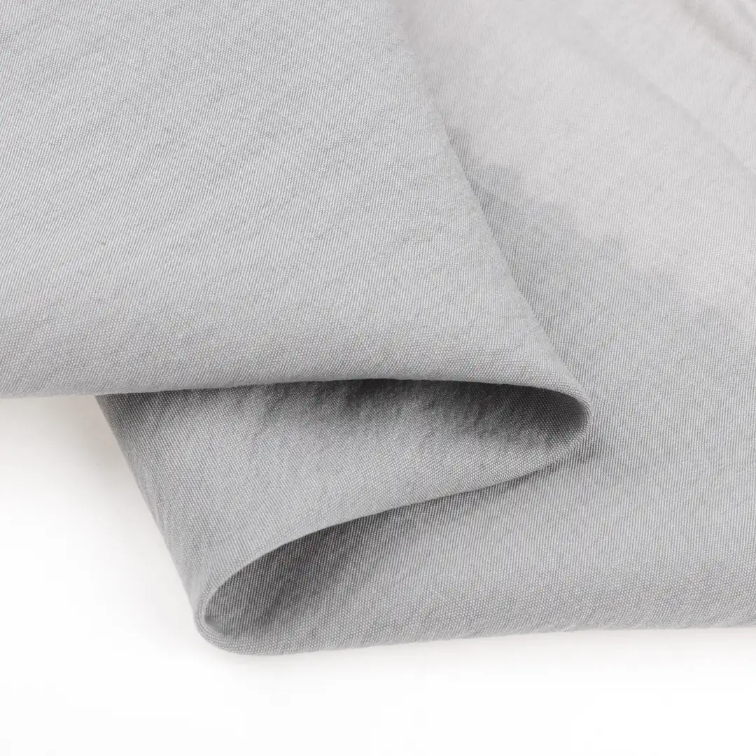 China Fabric for Shirt,Shorts,Skirt  Crepe Woven Blended Fabric Tencel Nylon light gray color buy from China wholesaler bulk order at wholesale price free worldwide shipping Alibaba