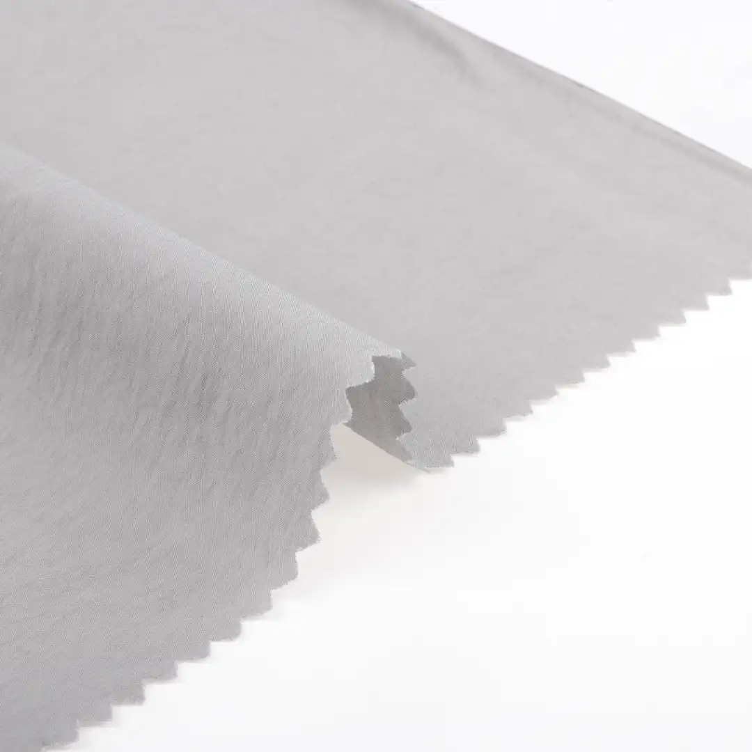 China Fabric for Shirt,Shorts,Skirt  Crepe Woven Blended Fabric Tencel Nylon light gray color buy from China wholesaler bulk order at wholesale price free worldwide shipping Alibaba