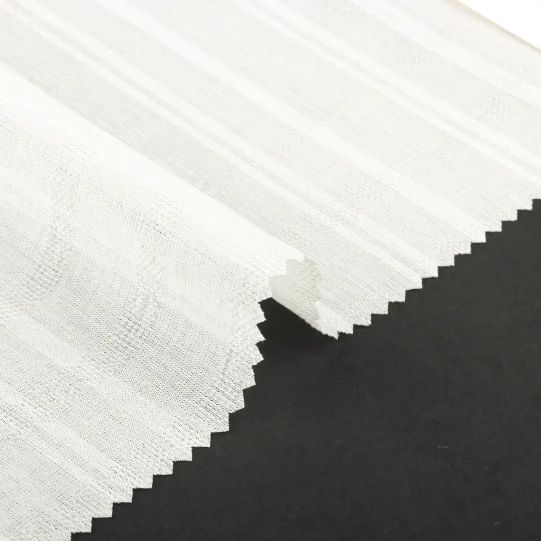 China Fabric for Shirt,Blouse,Skirt,Skirt ,Wide Leg Trousers,Bubble-Sleeve Crop Top Jacquard Woven Blended Fabric Lyocell Rayon Nylon cream color buy from China wholesaler bulk order at wholesale price free worldwide shipping Alibaba