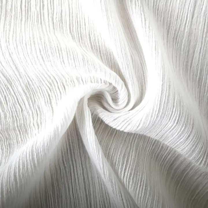 India Fabric for Shirt Cotton Crepe Natural Woven Fabric Cotton White color buy from India wholesaler bulk order at wholesale price free worldwide shipping Alibaba