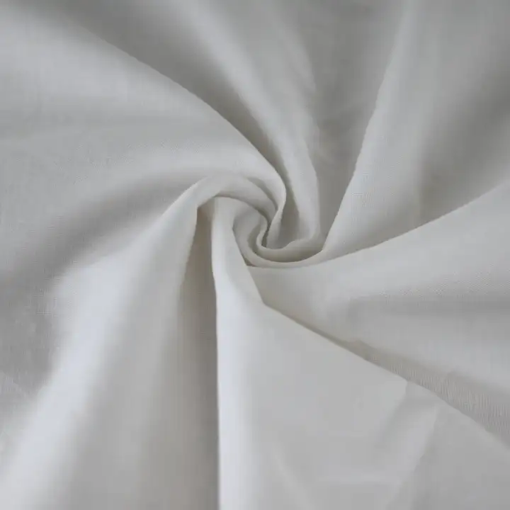 India Fabric for Shirt Cotton Plain Natural Woven Fabric Cotton Off White color buy from India wholesaler bulk order at wholesale price free worldwide shipping Alibaba