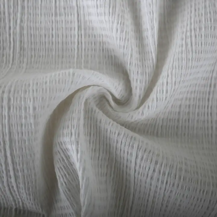 India Fabric for Shirt Cotton Crepe Natural Woven Fabric Cotton Off White color buy from India wholesaler bulk order at wholesale price free worldwide shipping Alibaba