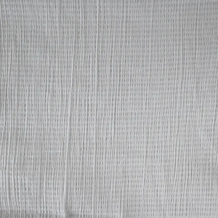 India Fabric for Shirt Cotton Crepe Natural Woven Fabric Cotton Off White color buy from India wholesaler bulk order at wholesale price free worldwide shipping Alibaba