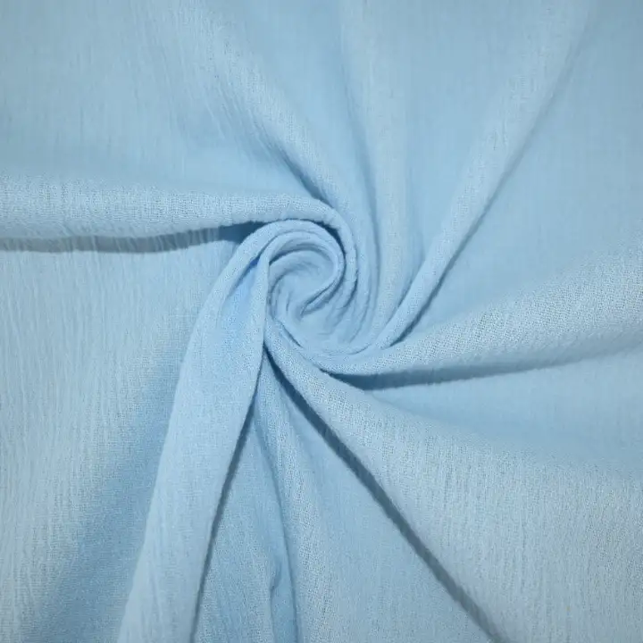 India Fabric for Skirt Cotton Crepe Natural Woven Fabric Cotton Sky Blue color buy from India wholesaler bulk order at wholesale price free worldwide shipping Alibaba