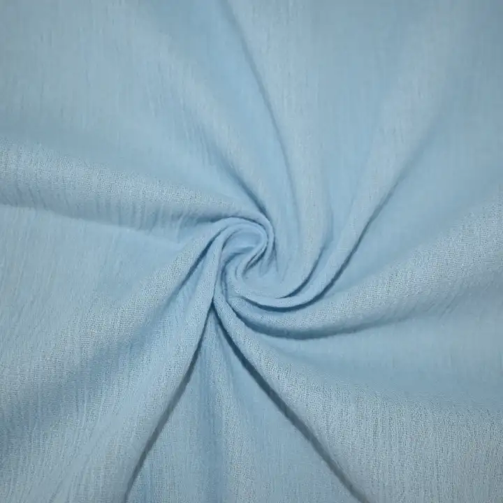 India Fabric for Skirt Cotton Crepe Natural Woven Fabric Cotton Sky Blue color buy from India wholesaler bulk order at wholesale price free worldwide shipping Alibaba