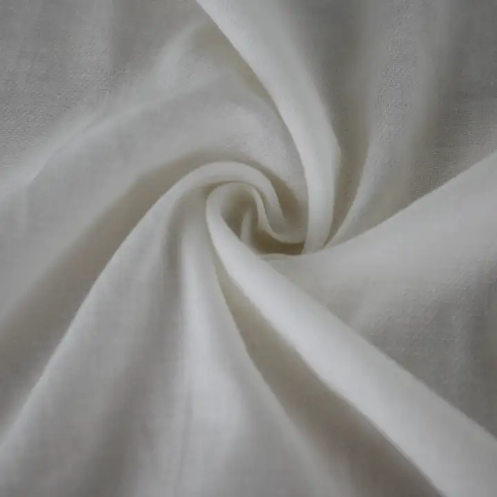 India Fabric for Shirt Cotton Plain Natural Woven Fabric Cotton Viscose Off White color buy from India wholesaler bulk order at wholesale price free worldwide shipping Alibaba