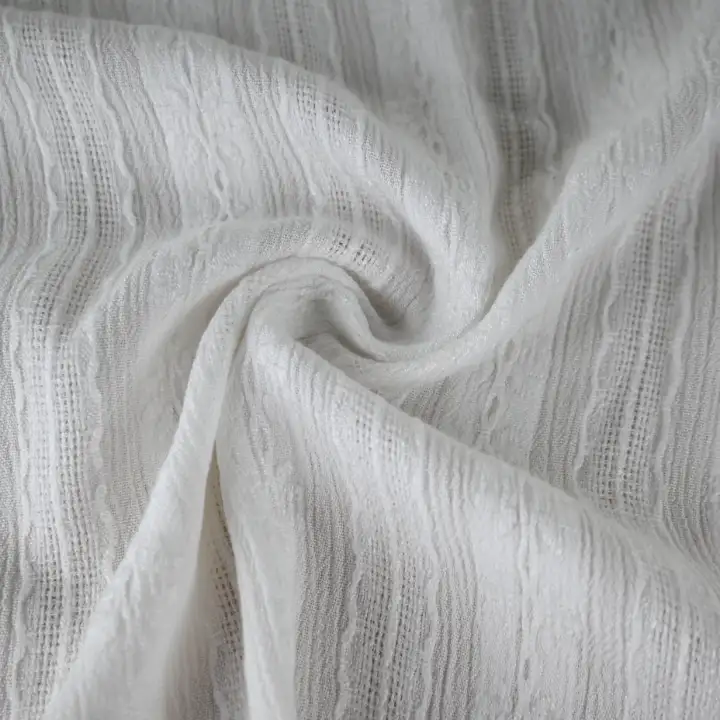 India Fabric for Shirt Viscose/Rayon Crepe Natural Woven Fabric Viscose Off White color buy from India wholesaler bulk order at wholesale price free worldwide shipping Alibaba