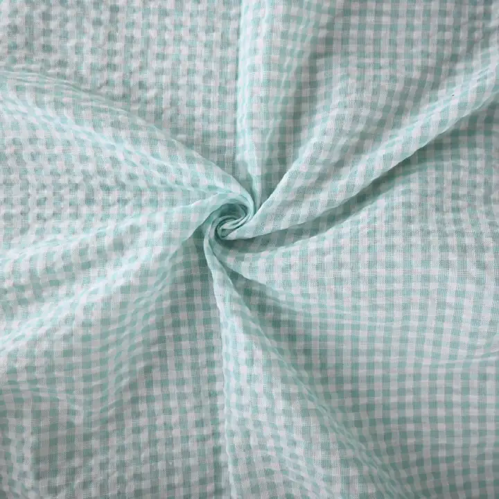 India Fabric for Shirt Cotton Seersucker Natural Woven Fabric Cotton See Green/White Check color buy from India wholesaler bulk order at wholesale price free worldwide shipping Alibaba