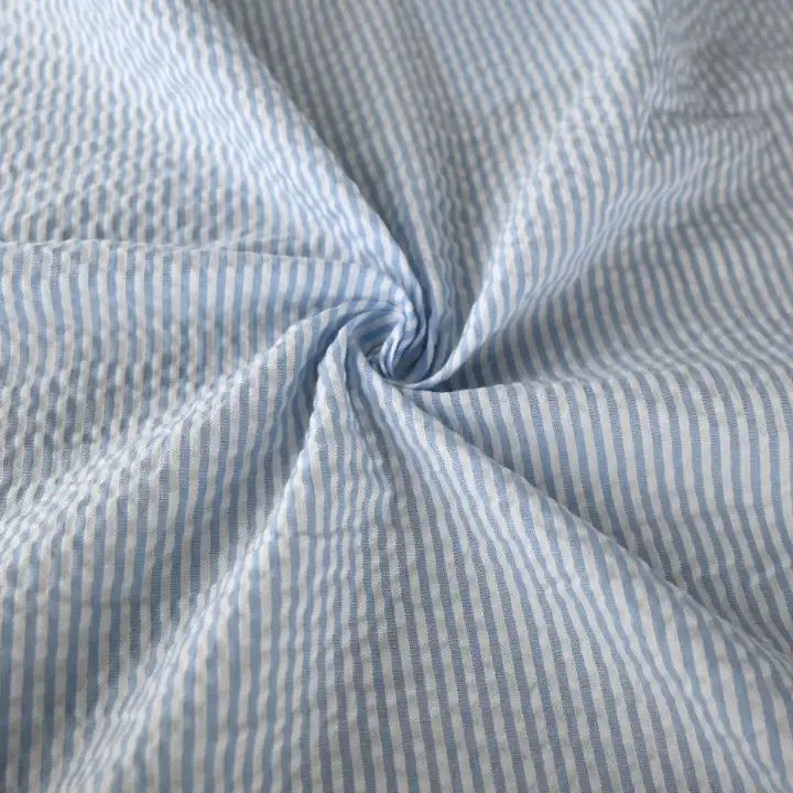 India Fabric for Pajamas Cotton Seersucker Natural Woven Fabric Cotton Blue/White Stripe color buy from India wholesaler bulk order at wholesale price free worldwide shipping Alibaba