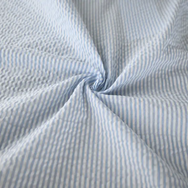 India Fabric for Pajamas Cotton Seersucker Natural Woven Fabric Cotton Blue/White Stripe color buy from India wholesaler bulk order at wholesale price free worldwide shipping Alibaba