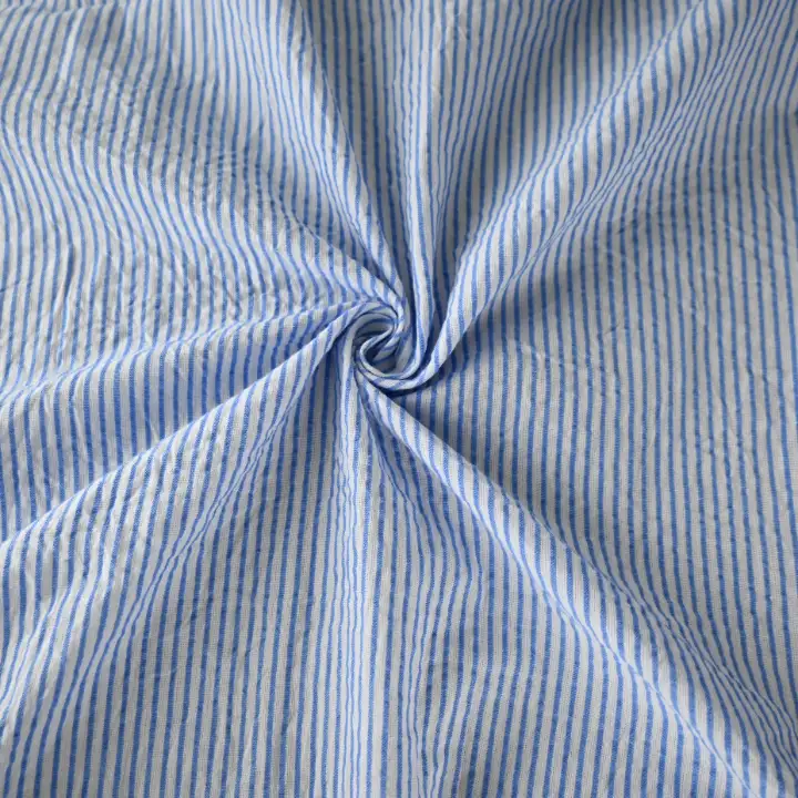 India Fabric for Shirt Cotton Seersucker Natural Woven Fabric Cotton White/Blue Stripe color buy from India wholesaler bulk order at wholesale price free worldwide shipping Alibaba