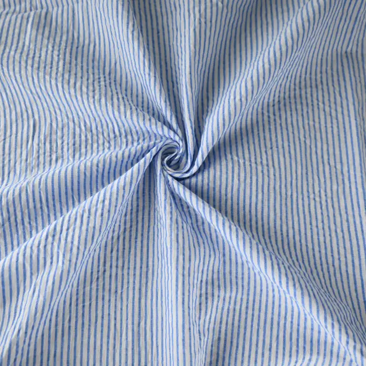 India Fabric for Shirt Cotton Seersucker Natural Woven Fabric Cotton White/Blue Stripe color buy from India wholesaler bulk order at wholesale price free worldwide shipping Alibaba