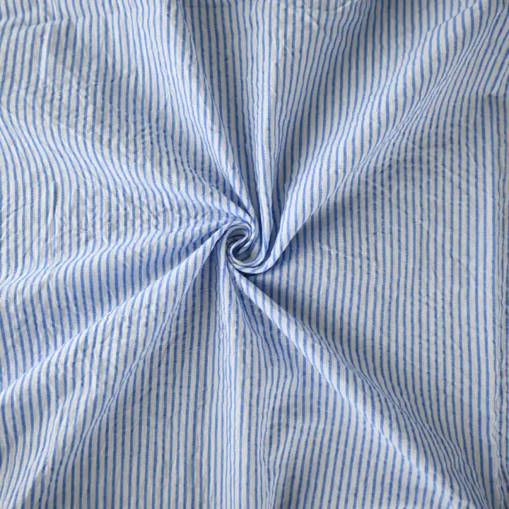 India Fabric for Shirt Cotton Seersucker Natural Woven Fabric Cotton White/Blue Stripe color buy from India wholesaler bulk order at wholesale price free worldwide shipping Alibaba