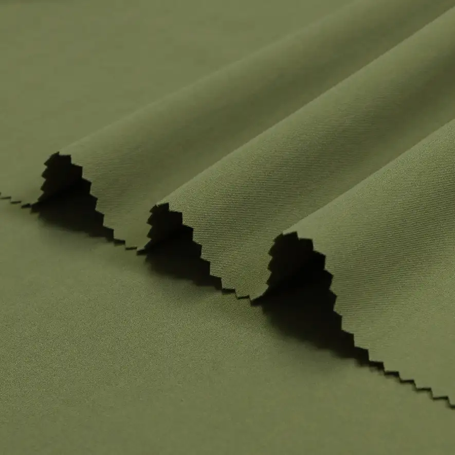China Fabric for Pants,Skirt,Ladies Belt Buckle Cargo A-Line Skirt Twill Synthetic Woven Fabric Polyester dark green color buy from China wholesaler bulk order at wholesale price free worldwide shipping Alibaba