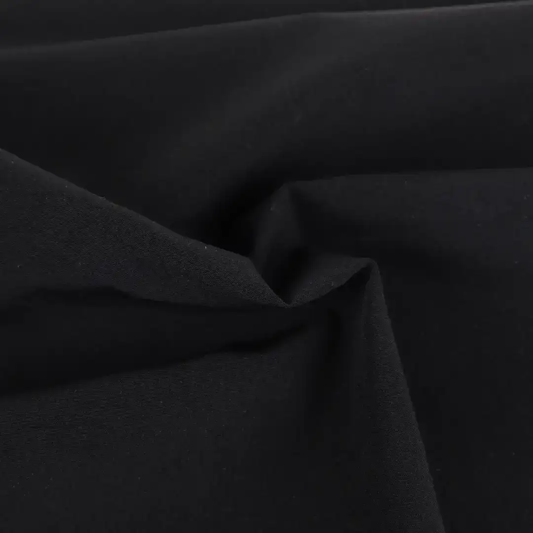 China Fabric for Crop Top,Tracksuits,Swim shorts Polyester Peach Skin Microfiber Fabric Synthetic Woven Fabric Nylon Spandex Black color buy from China wholesaler bulk order at wholesale price free worldwide shipping Alibaba