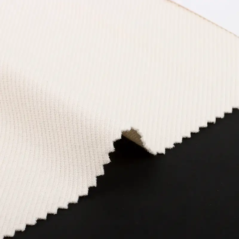 China Fabric for T-Shirt Weft Jacquard Knit Fabric Cotton Polyester Elastane off-white color buy from China wholesaler bulk order at wholesale price free worldwide shipping Alibaba