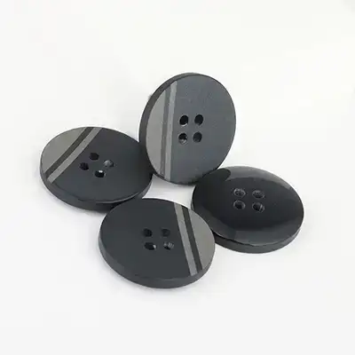 Black 4 holes Resin Button for Overcoat buy garments accessories in bulk from China wholesaler at wholesale price free worldwide shipping Alibaba