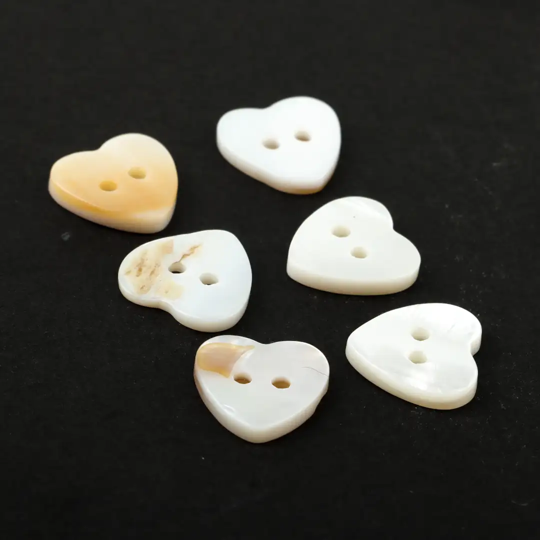 White 2 holes Shell Button for T-Shirt buy garments accessories in bulk from China wholesaler at wholesale price free worldwide shipping Alibaba