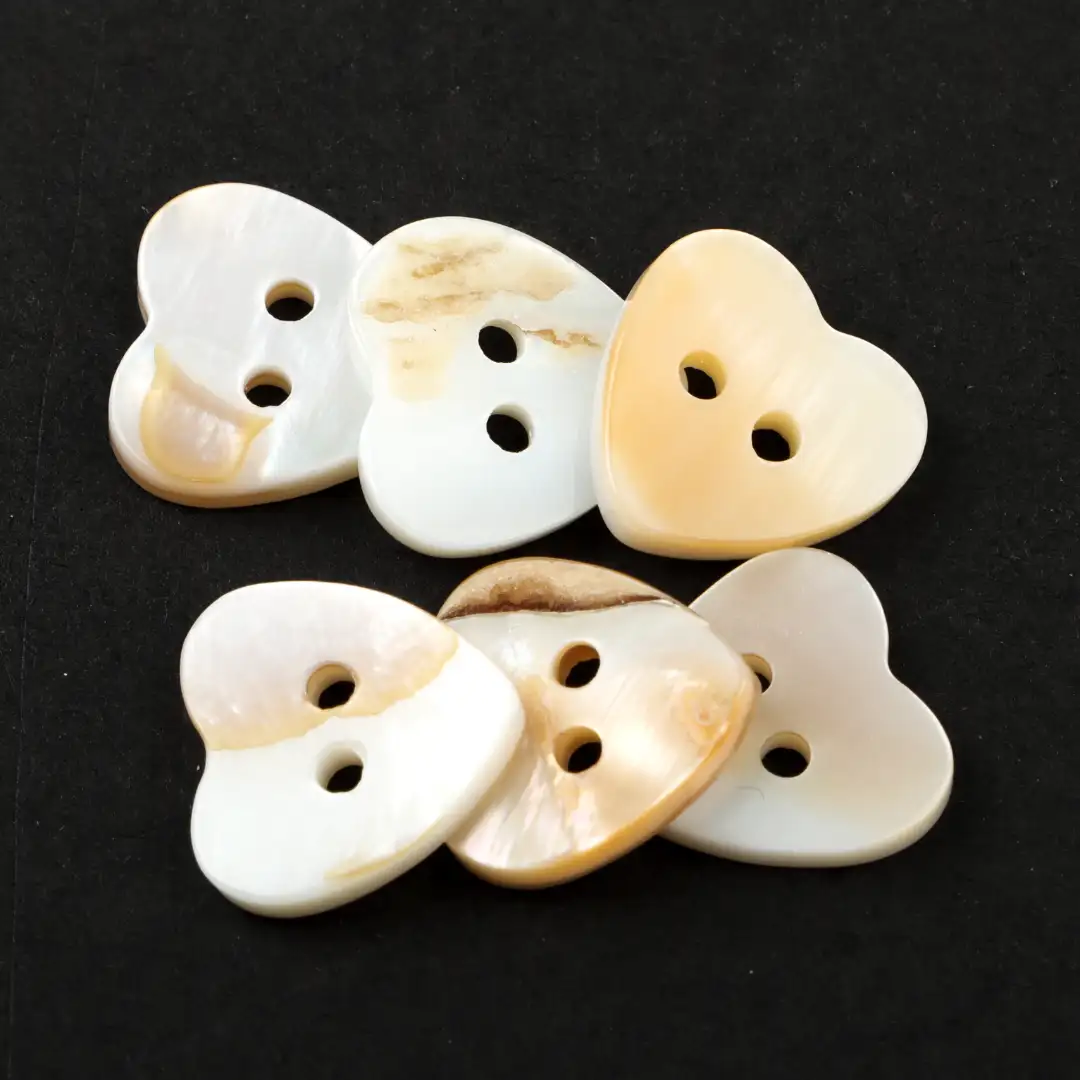 White 2 holes Shell Button for T-Shirt buy garments accessories in bulk from China wholesaler at wholesale price free worldwide shipping Alibaba